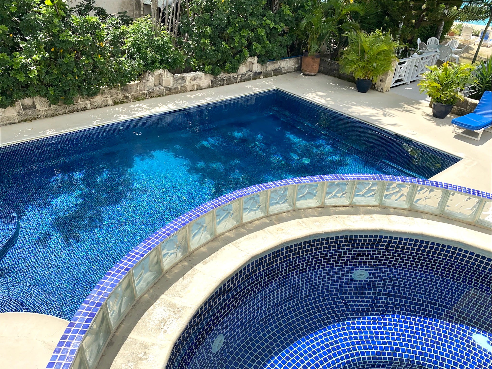 Spectacular luxury is waiting for your in the private hot tub overlooking the pool and Caribbean Sea at Tantalus Villa.